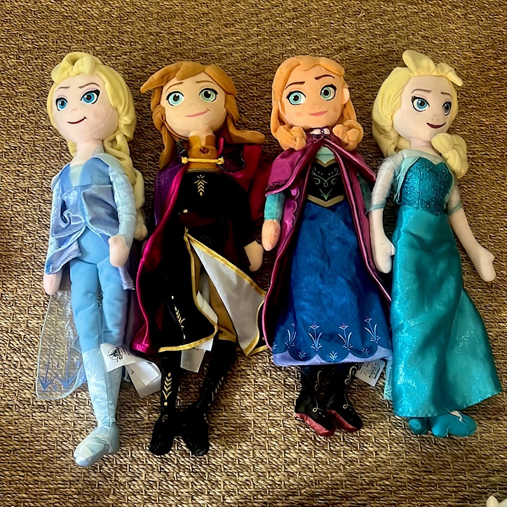 Lot of 4 Disney plush dolls, Including Elsa and Anna from Both Frozen 1 and 2.